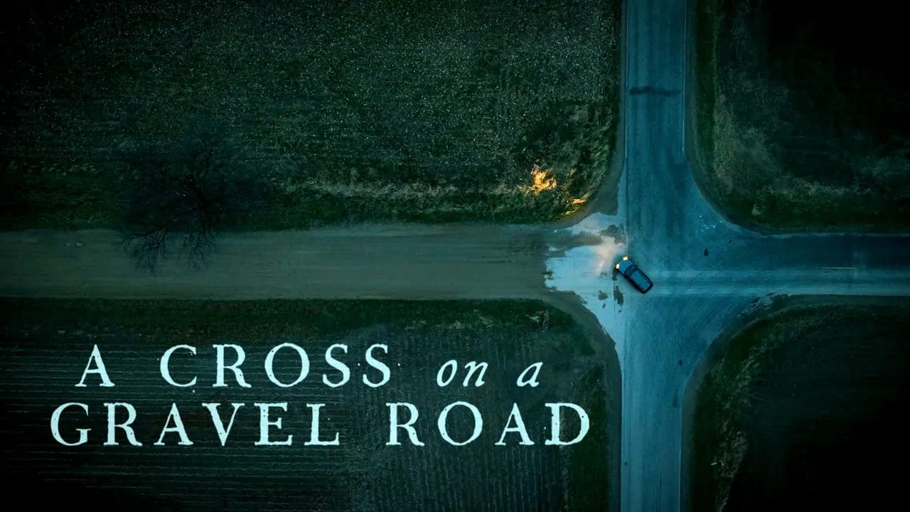 A Cross on a Gravel Road